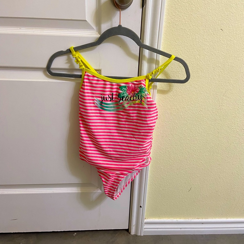 Pink stripped swimsuit girl